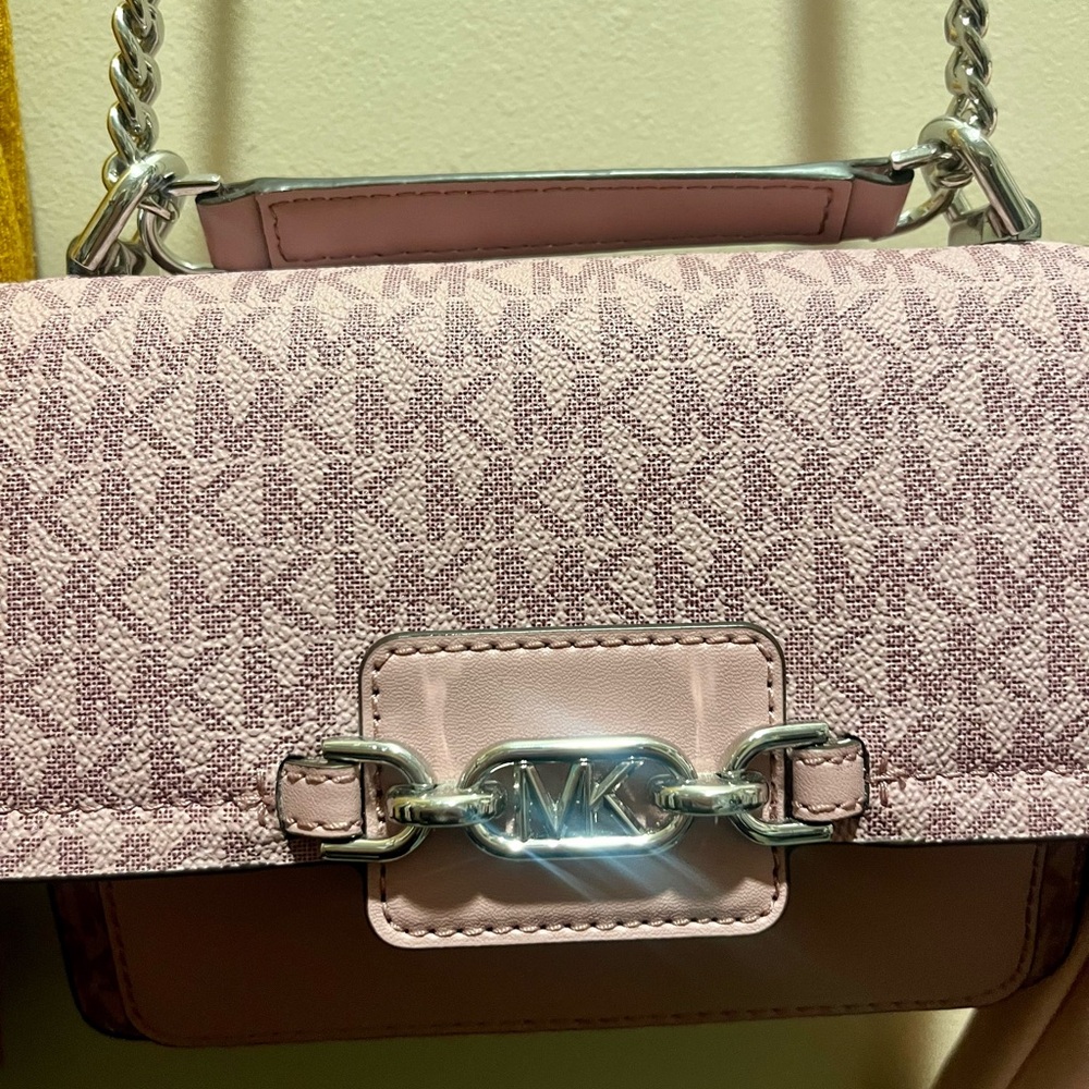 Michael Kors never used leather purple crossbody purse with chain strap.